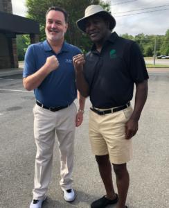 Boxing legend, Evander Holyfield, with VIP Staff at The Masters